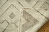 Hand woven flatweave corner of the abstract ivory and grey geometric Kilim.