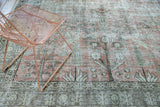 Faded blush and green tree of life pattern, distressed vintage Tabriz carpet.