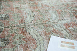 Hard even distress on vintage Tabriz carpet, showing exposed foundation, blush, and green.