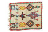 Hand-knotted vintage Moroccan square rug, ivory field with bold red, yellow, blue geometric motifs, 3'11