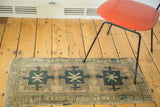 Vintage Oushak rug runner with three geometric medallions in mallard green and faded copper.