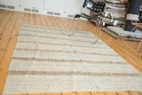 Modern hand-woven Turkish kilim featuring grey, charcoal brown, and bronze stripes.