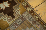 Oushak runner corner detailing hand-knotted construction, geometric medallion, and woven back.