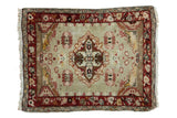 Distressed vintage Oushak rug with faded sea foam field, quatrefoil medallion, red floral borders. 2'8