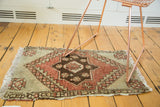 Hand knotted Oushak rug, village-type, with irregular weave and stepped medallion.