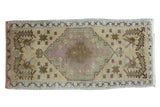 Vintage Oushak runner, hexagonal medallion, star motifs, in subdued ivory, mauve, and bronze.