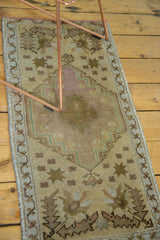 Vintage Oushak runner with quadruple star design and subtle beige, mauve, brown tones.