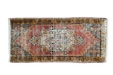 Vintage Oushak runner, distressed cinnabar and ivory stepped medallion, floral border, 1'8