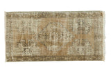 Super distressed vintage Oushak rug with faded coffee brown, charcoal medallion, and floral patterns, 1'9