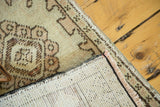 Hand-knotted back and detailed pile of Vintage Oushak rug with sand blush pattern.