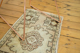 Turkish Oushak runner corner showing germinating planter design in muted tones.
