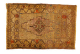 Vintage Oushak rug mat, gold speckled field, stepped lozenge medallion, floral borders.