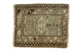 Vintage Oushak rug with geometric medallions, barber pole border, charcoal and ivory.