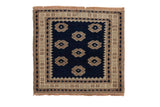 Vintage Oushak square rug mat with dark navy blue field, asymmetric floral design, beige floral border.