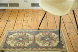 Vintage Oushak runner with blush, ivory, sand, and grey double crab and star medallions.