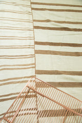 Vintage Turkish Kilim's hand-woven ivory and bronze stripes with central panel seam.