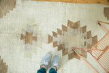 Vintage Tulu rug runner with stepped asymmetric ivory, coffee, and mauve medallions.