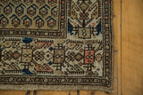 Vintage Malayer runner's intricate geometric border, fringe, and sand-toned field.