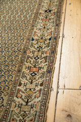Hand-knotted Vintage Persian Malayer runner: geometric border and repeating sand, blue boteh pattern.