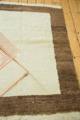 Thick, hand-knotted pile of the vintage ivory and milk chocolate brown Tulu rug.