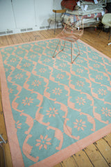 Hand woven Indian Dhurrie carpet with aqua turquoise and blush rose floral lattice.