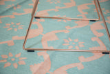 Hand-woven Indian Dhurrie flat weave, featuring aqua turquoise and blush rose floral lattice.