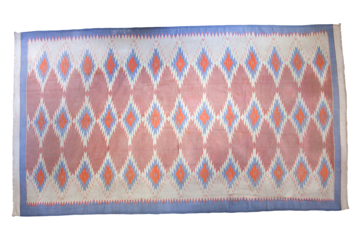 Vintage Dhurrie carpet with southwestern geometric diamond pattern in red, blue, ivory, orange.