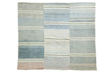Hand woven Turkish vintage rag rug with modern stripes in blue, ivory, charcoal, and red.
