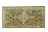 Vintage Turkish Sivas rug with antique peach and sea foam green stepped medallion.