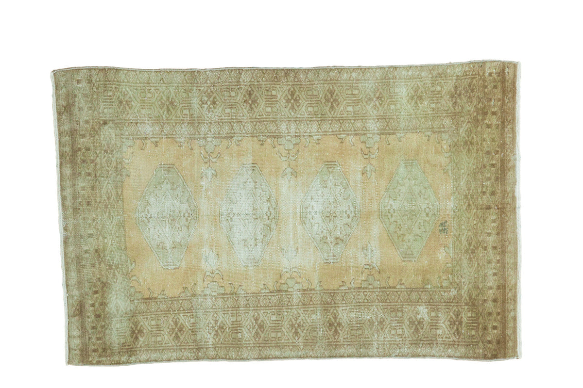 Distressed vintage Pakistani rug with quadruple medallions, geometric border, sand, peach, green palette, 2x3.