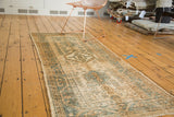Circa 1930s Karaja runner featuring faded tribal geometrics in creamy beige and muted teal.