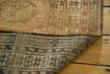 Vintage Afghan Rug's hand-knotted foundation and secured edge, showing dark navy aqua tones.