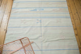 Vintage Dhurrie rug with pale seafoam green, light blue stripes and subtle diamond motif.