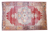Distressed Oushak rug, crimson red field with oversized medallion and cloudband motifs. 9x14.