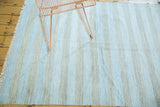 Modern Dhurrie rug with alternating pale sky blue and charcoal stripes.