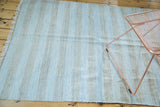 Modern hand woven Dhurrie rug, fringed end with pale blue and charcoal stripes.