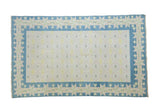 Vintage Cotton Dhurrie rug featuring an allover pattern and denim blue geometric star border.