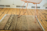 Hand-knotted vintage Persian Gabbeh rug, plush pile with tonal abrashes in bronze, brown, and charcoal.
