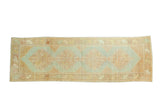 Light and airy vintage Oushak runner with quadruple stepped medallions, sea foam green, peach.