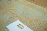 Pastel sea foam, aqua blue, and light peach stepped motif on a vintage Oushak runner.