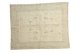 Vintage Oushak rug with carved ivory and pale blue scattered patterns, 5'10