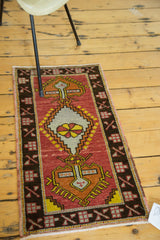 Vintage Oushak rug runner, lower stepped medallion, geometric border, brick red, secured end.