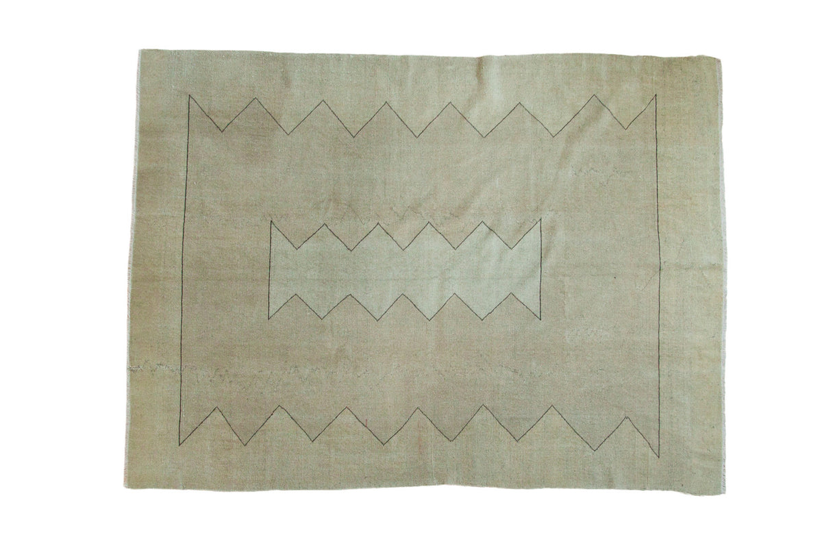Neutral-toned distressed Oushak carpet with minimalist charcoal zigzag pattern. 5'10" x 7'10".