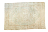 Vintage Distressed Oushak carpet, large medallion, pale mint green, ivory, beige, with even hard distress.