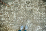 Heavy recess to pile and exposed foundation on a distressed vintage Tabriz rug.