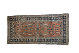 Antique Heriz Persian runner, soft brick red field, navy geometric floral border. 3'2