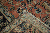Hand-knotted construction of Antique Heriz runner, showing precise weave, geometric field, and light tatter.