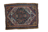 Distressed Antique Qashqai rug, hexagonal medallion, rich navy, wine, ivory, gold palette. 5' x 6'4