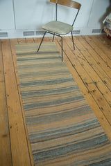 Hand woven Turkish kilim runner with horizontal stripes of apricot beige and slate, even distress.