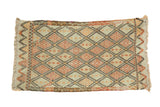 Vintage Turkish Jijim rug, geometric diamond lattice in pale green, red, orange.